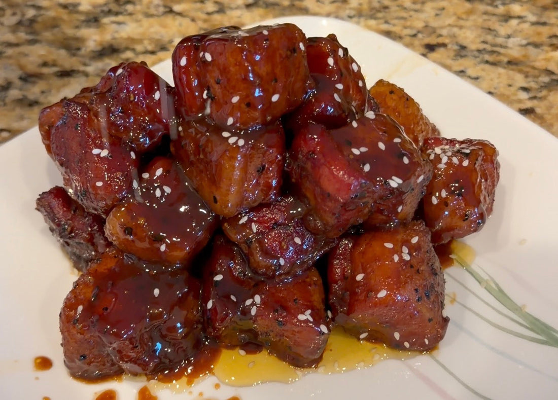 Asian Bang pork belly burnt ends coated in a sticky sweet and savory glaze