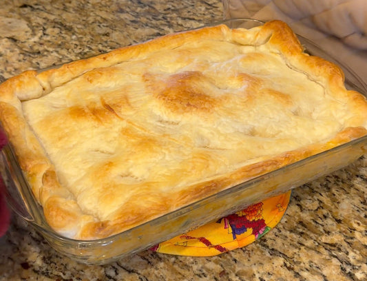 Quick and Easy Chicken Pot Pie with golden puff pastry crust