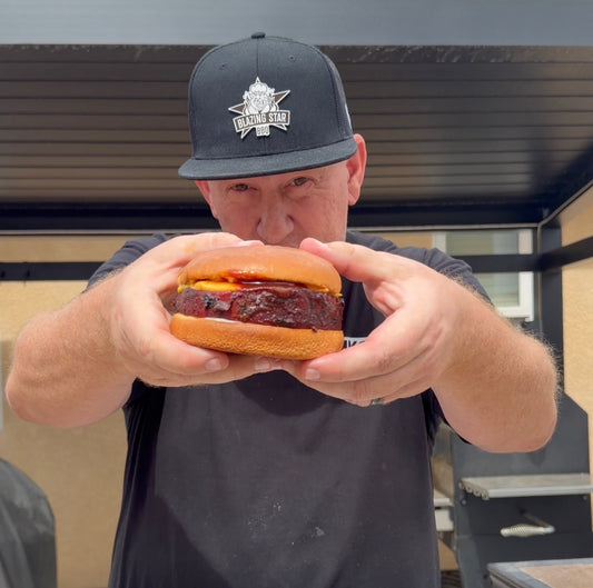 Smoked bologna sandwich with thick-cut bologna, melted American cheese and BBQ sauce on a toasted bun
