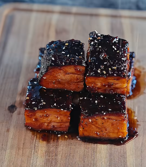 Beerylicious pork belly burnt ends coated in a berry jalapeño glaze