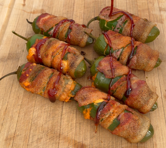 Smoked Chorizo Jalapeño Poppers wrapped in bacon and finished with hot honey