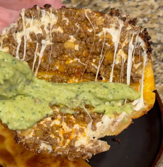 Crispy beef tacos filled with seasoned ground beef and melted cheese