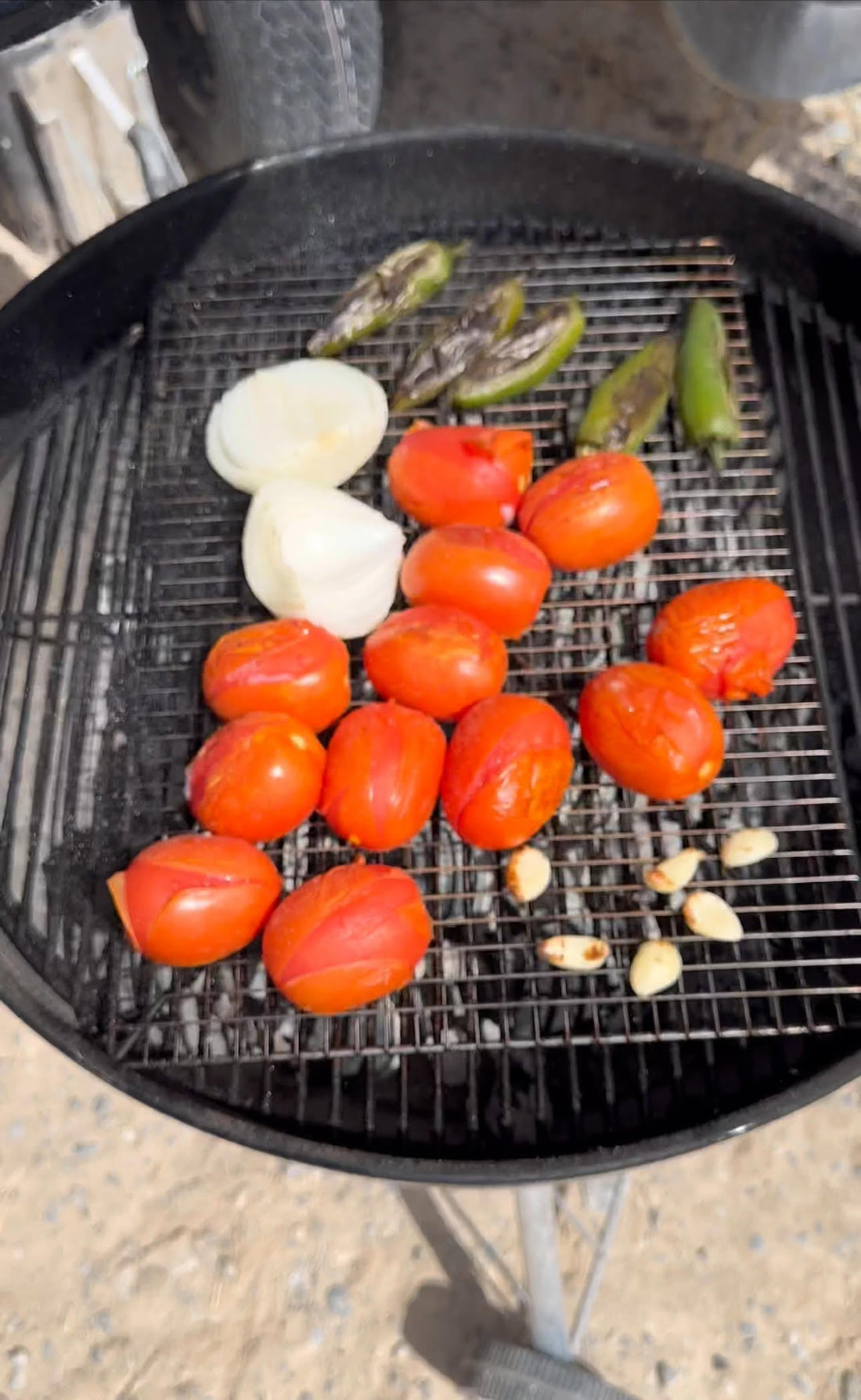 Homemade fire roasted salsa with charred tomatoes, jalapeños, onion and cilantro